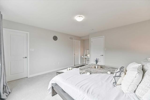 128 Huguenot Rd, Townhouse with 3 bedrooms, 3 bathrooms and 2 parking in Oakville ON | Image 22