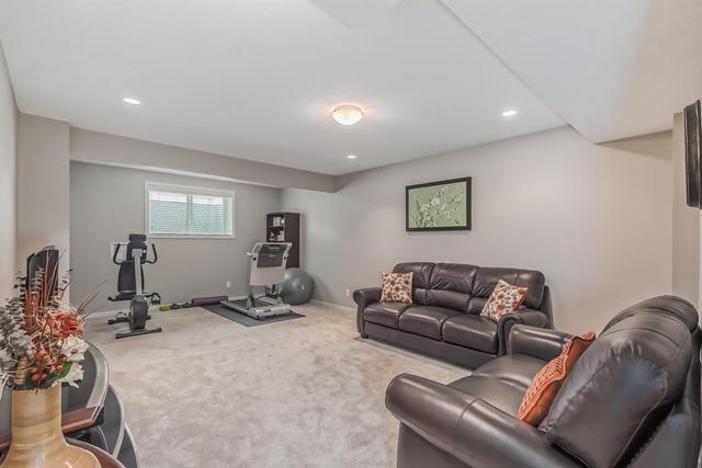 129 West Grove Way Sw, House detached with 4 bedrooms, 3 bathrooms and 4 parking in Calgary AB | Image 41