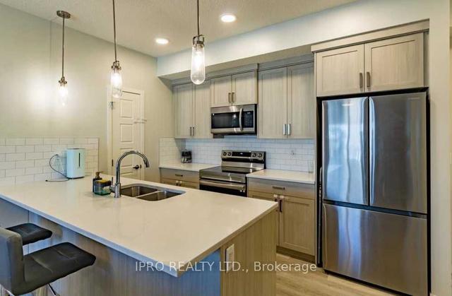 201 - 40 Carrington Plaz, Condo with 2 bedrooms, 2 bathrooms and 1 parking in Calgary AB | Image 5