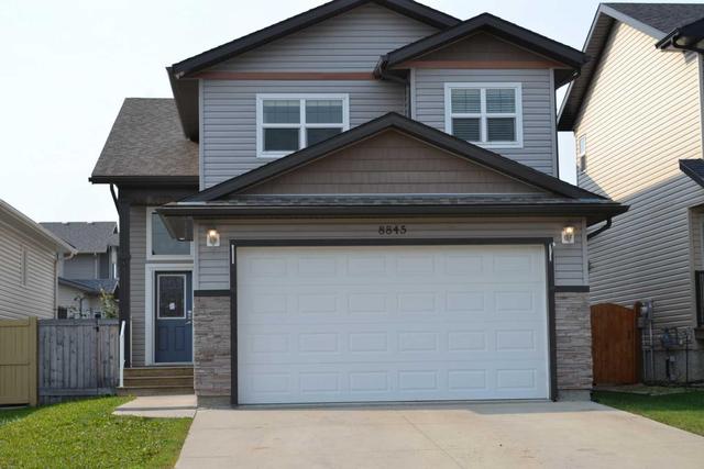8845 74 Avenue, House detached with 5 bedrooms, 3 bathrooms and 6 parking in Grande Prairie AB | Image 1