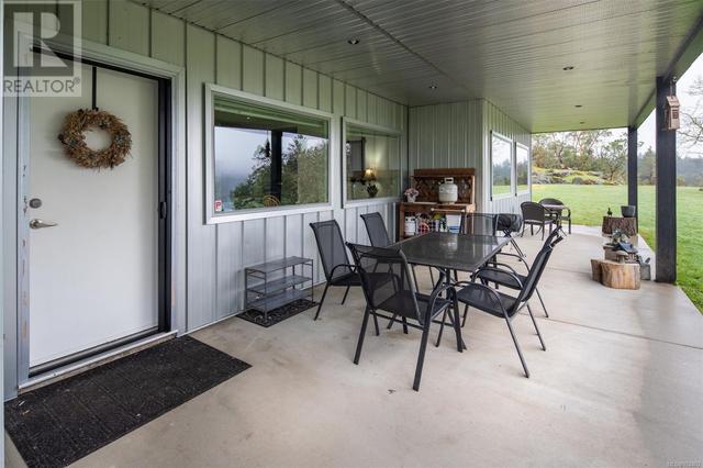Suite covered patio | Image 40