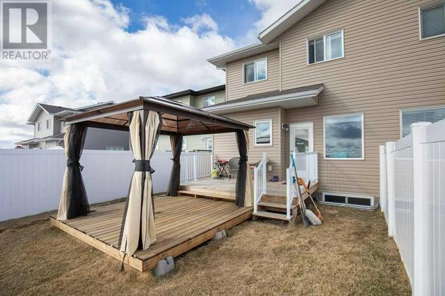 51 Iron Gate Boulevard, House semidetached with 3 bedrooms, 2 bathrooms and 2 parking in Sylvan Lake AB | Image 6