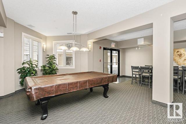 103 - 6083 Maynard Wy Nw, Condo with 1 bedrooms, 1 bathrooms and 1 parking in Edmonton AB | Image 46