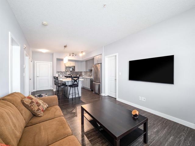 1110 - 3727 Sage Hill Drive Nw, Condo with 2 bedrooms, 2 bathrooms and 1 parking in Calgary AB | Image 9