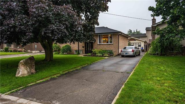 80 James Avenue, House detached with 4 bedrooms, 2 bathrooms and 4 parking in Brantford ON | Image 1