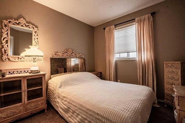 9011 64 Avenue, Home with 4 bedrooms, 2 bathrooms and 2 parking in Grande Prairie AB | Image 7