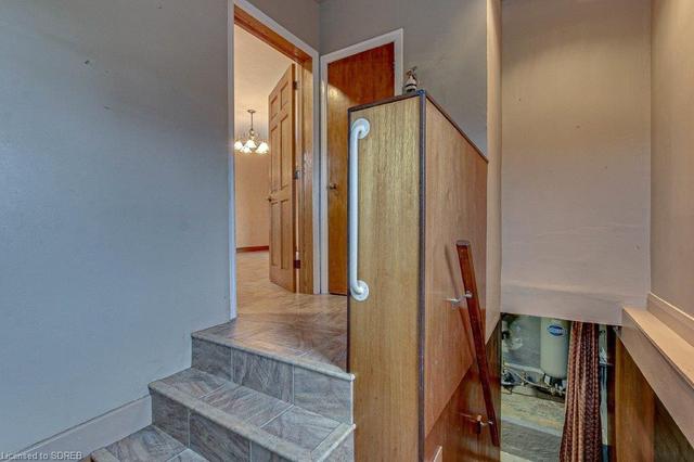 mudroom entry to kitchen and basement | Image 19