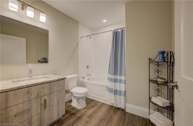 Four-piece main bath with extra wide doorway. | Image 14