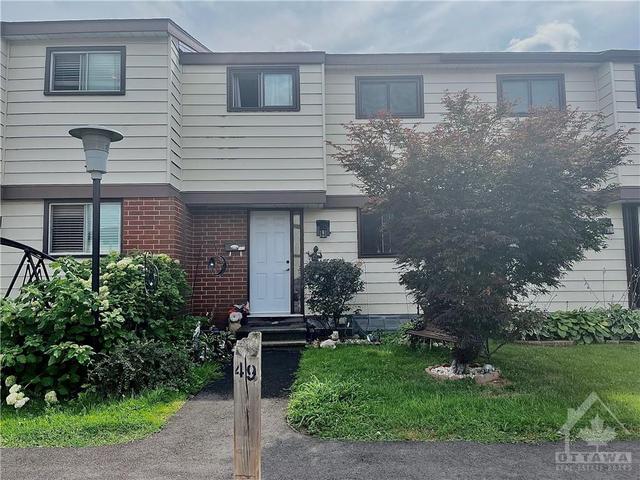 c - 77 Foxfield Drive, Townhouse with 3 bedrooms, 2 bathrooms and 1 parking in Ottawa ON | Image 1