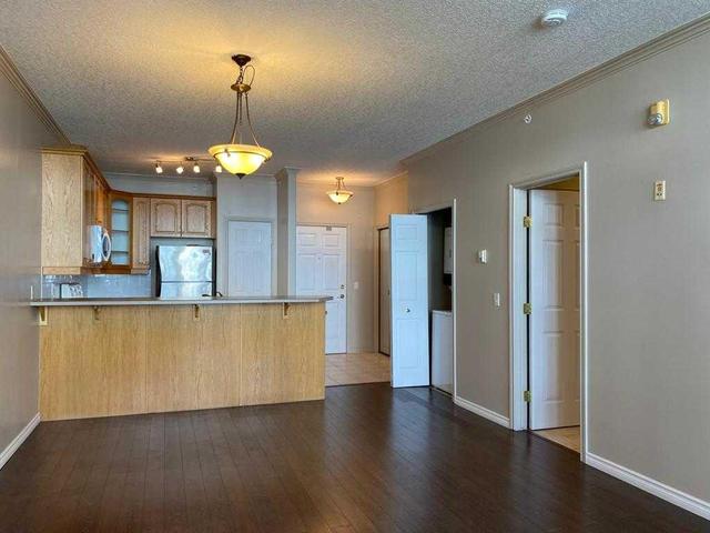 409 - 495 78 Avenue Sw, Condo with 2 bedrooms, 1 bathrooms and 1 parking in Calgary AB | Image 2