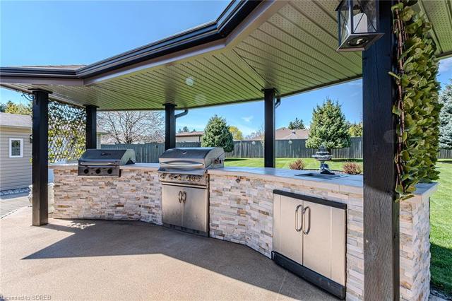 Custom outdoor kitchen with Charcoal and Gas BBQ | Image 39