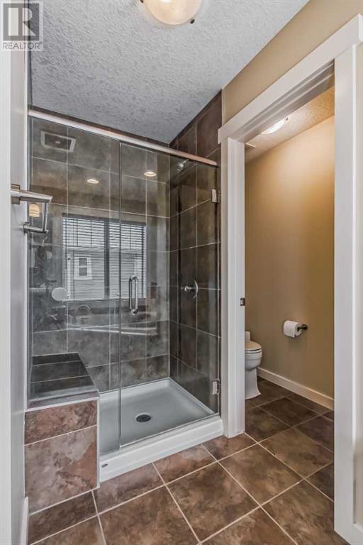 128 Mike Ralph Way Sw, House detached with 4 bedrooms, 3 bathrooms and 2 parking in Calgary AB | Image 25