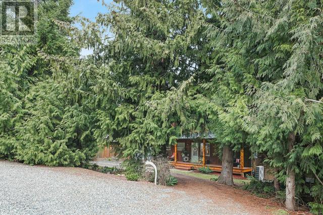 7754 Vivian Way, House detached with 3 bedrooms, 3 bathrooms and 4 parking in Comox Valley A BC | Image 35