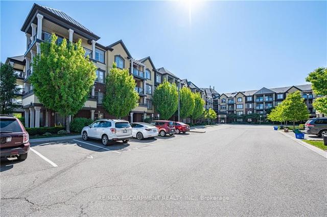 104 - 3060 Rotary Way, Condo with 1 bedrooms, 1 bathrooms and 2 parking in Burlington ON | Image 24