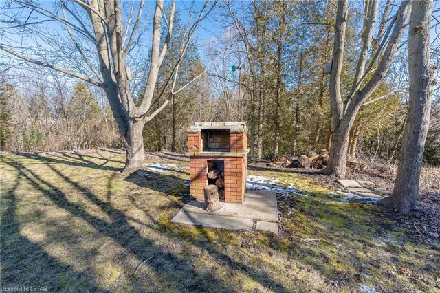 Fireplace at the back of the property. | Image 29