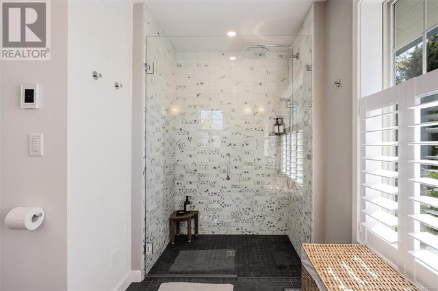 and a walk-in shower with exquisite tiles | Image 29