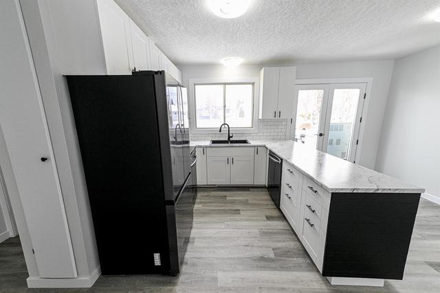 9319 112 Ave, House detached with 5 bedrooms, 2 bathrooms and 5 parking in Grande Prairie AB | Image 10