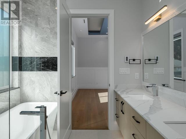 Master ensuite with soaker tub and full size stand up shower | Image 46