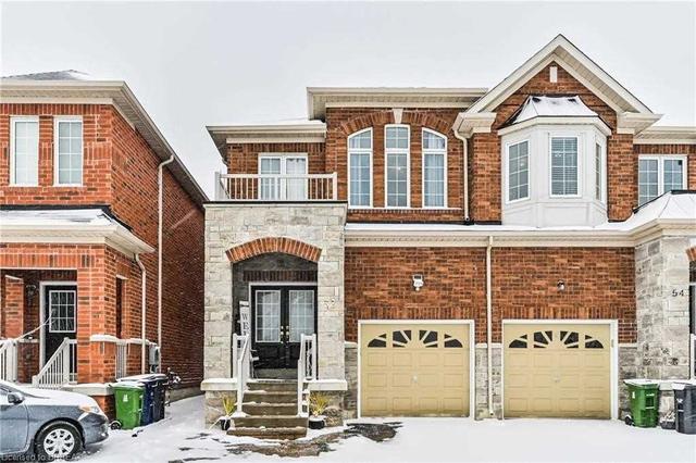 52 Isaac Devins Blvd, House semidetached with 3 bedrooms, 4 bathrooms and 3 parking in Toronto ON | Image 1