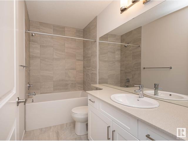 5702 Juchli Av Nw, House attached with 3 bedrooms, 3 bathrooms and null parking in Edmonton AB | Image 24