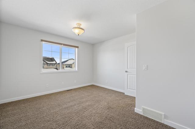 243 Kingsbridge Road Se, Home with 2 bedrooms, 3 bathrooms and 3 parking in Airdrie AB | Image 22
