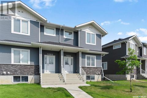 1018 Evergreen Boulevard, House attached with 3 bedrooms, 3 bathrooms and null parking in Saskatoon SK | Card Image
