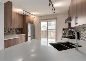 836 68 Avenue Sw, Home with 4 bedrooms, 2 bathrooms and 2 parking in Calgary AB | Image 2