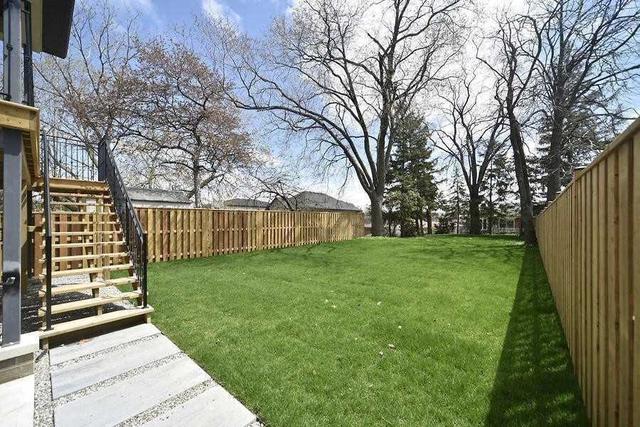 95 Falstaff Ave, House detached with 4 bedrooms, 5 bathrooms and 6 parking in Toronto ON | Image 32