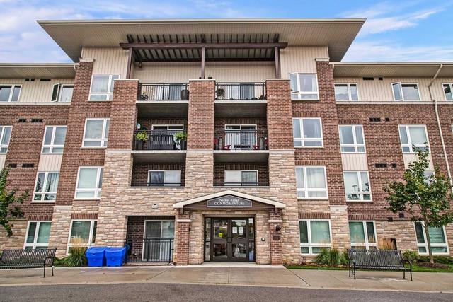 202 - 103 Westminster Cres, Condo with 2 bedrooms, 1 bathrooms and 1 parking in Centre Wellington ON | Image 1