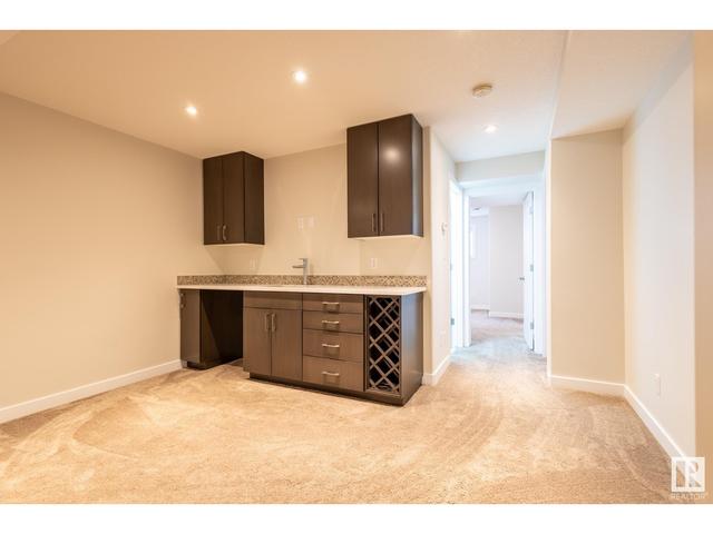7551 80 Av Nw, House semidetached with 4 bedrooms, 4 bathrooms and null parking in Edmonton AB | Image 48