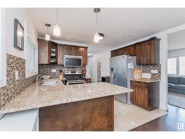 4707 107 Av Nw, House detached with 4 bedrooms, 2 bathrooms and null parking in Edmonton AB | Image 12