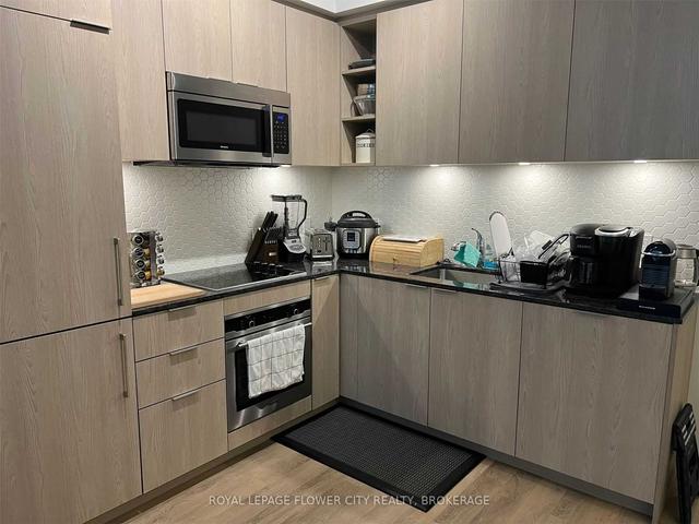 325 - 50 Ordnance St, Condo with 1 bedrooms, 2 bathrooms and 1 parking in Toronto ON | Image 2