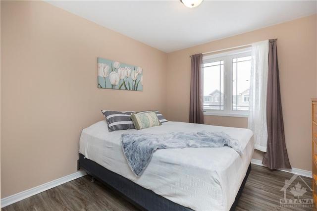 705 Regiment Avenue, Townhouse with 3 bedrooms, 3 bathrooms and 3 parking in Ottawa ON | Image 24