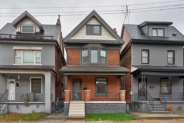 734 Cannon St E, House detached with 2 bedrooms, 4 bathrooms and 0 parking in Hamilton ON | Image 1