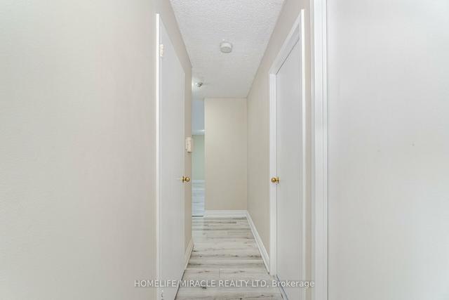 410 - 25 Kensington Rd, Condo with 2 bedrooms, 1 bathrooms and 1 parking in Brampton ON | Image 9