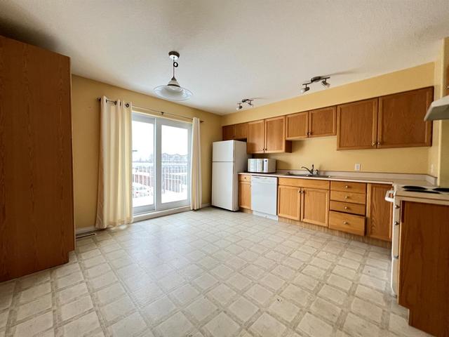 302 - 123 Arabian Drive, Home with 2 bedrooms, 1 bathrooms and 2 parking in Wood Buffalo AB | Image 7