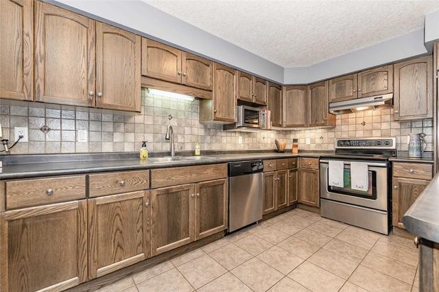 7 Penfold Dr, House detached with 2 bedrooms, 4 bathrooms and 3 parking in Guelph ON | Image 4