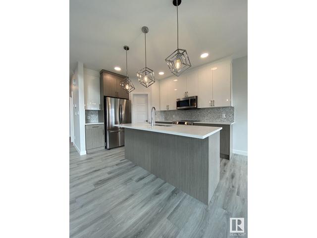 1156 Gyrfalcon Cr Nw, House detached with 6 bedrooms, 4 bathrooms and null parking in Edmonton AB | Image 14