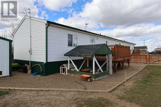 720 2 Street N, House other with 3 bedrooms, 2 bathrooms and 4 parking in Taber MD AB | Image 5