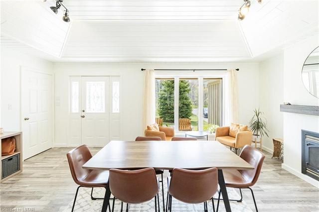 Imagine your family enjoying a meal in this large dining area with even more seating at the oversized island. | Image 7