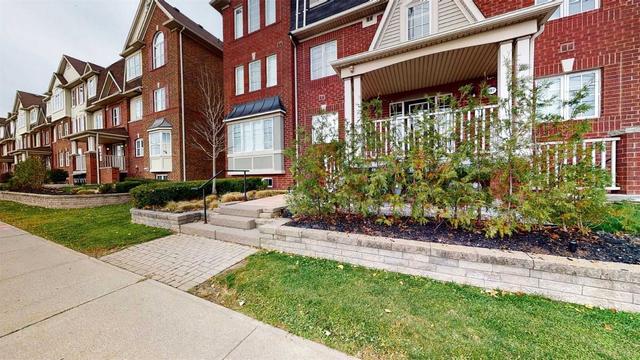 03 - 587 Dundas St W, House attached with 2 bedrooms, 2 bathrooms and 1 parking in Mississauga ON | Image 1