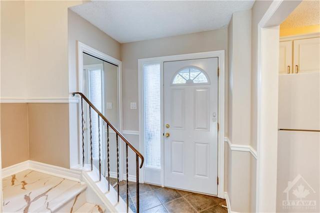 Bright foyer with mirrored closet | Image 3
