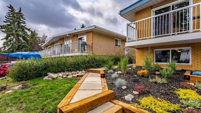 3768 36 Avenue Sw, Home with 4 bedrooms, 2 bathrooms and 2 parking in Calgary AB | Image 2
