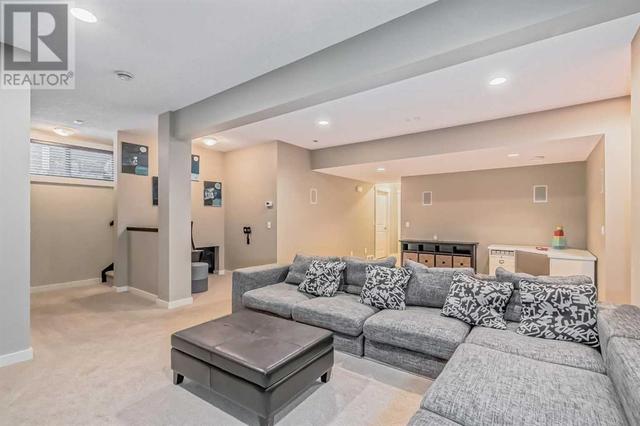 128 Mike Ralph Way Sw, House detached with 4 bedrooms, 3 bathrooms and 2 parking in Calgary AB | Image 39