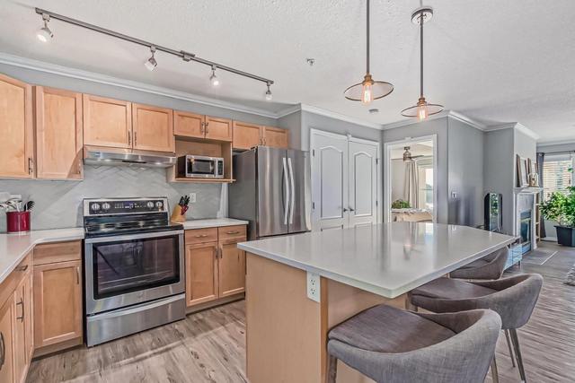 2115 - 303 Arbour Crest Drive Nw, Condo with 2 bedrooms, 2 bathrooms and 1 parking in Calgary AB | Image 11