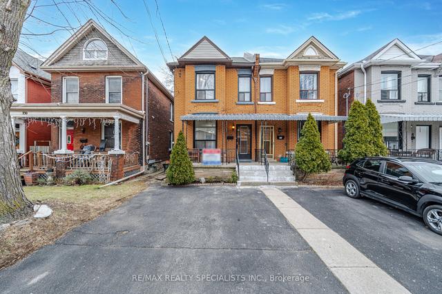 228 Locke St N, House semidetached with 3 bedrooms, 1 bathrooms and 2 parking in Hamilton ON | Image 1