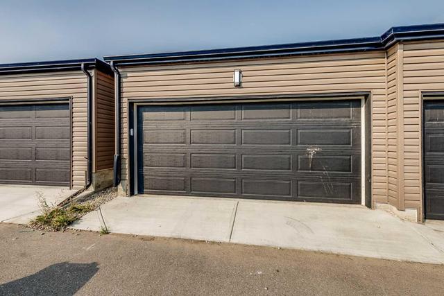 30 Midtown Boulevard Sw, Home with 3 bedrooms, 2 bathrooms and 2 parking in Airdrie AB | Image 21