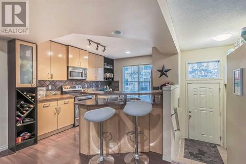 3074 New Brighton Gardens, House attached with 2 bedrooms, 2 bathrooms and 2 parking in Calgary AB | Card Image