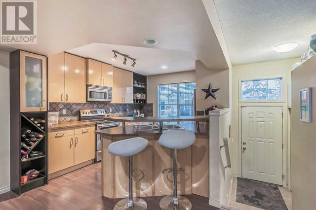 3074 New Brighton Gardens, House attached with 2 bedrooms, 2 bathrooms and 2 parking in Calgary AB | Image 1