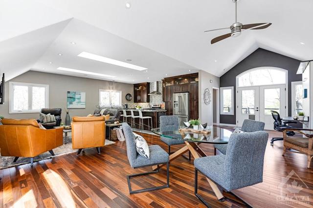 Dramatic vaulted ceiling in open living-dining and kitchen | Image 6